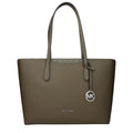 Michael Kors green fabric shoulder bag with adjustable strap and gold-tone hardware, stylish and spacious for everyday use.