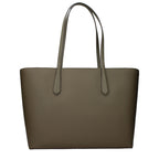 Michael Kors green fabric shoulder bag with adjustable strap and sleek design, perfect for everyday style and casual outings.