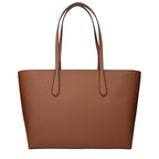 Michael Kors brown leather shoulder bag with silver hardware and adjustable strap, stylish accessory for everyday use.
