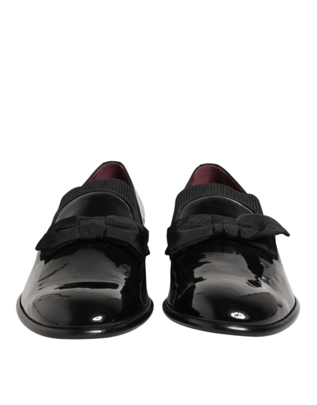 Black leather slip-on men's loafers by Dolce & Gabbana, showcasing sleek design and polished finish.