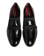 Dolce & Gabbana black leather slip-on dress loafers for men, stylish and sleek footwear with a polished finish.