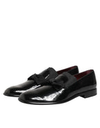 Dolce & Gabbana black leather slip-on loafers for men, stylish dress shoes with sleek design and premium craftsmanship.