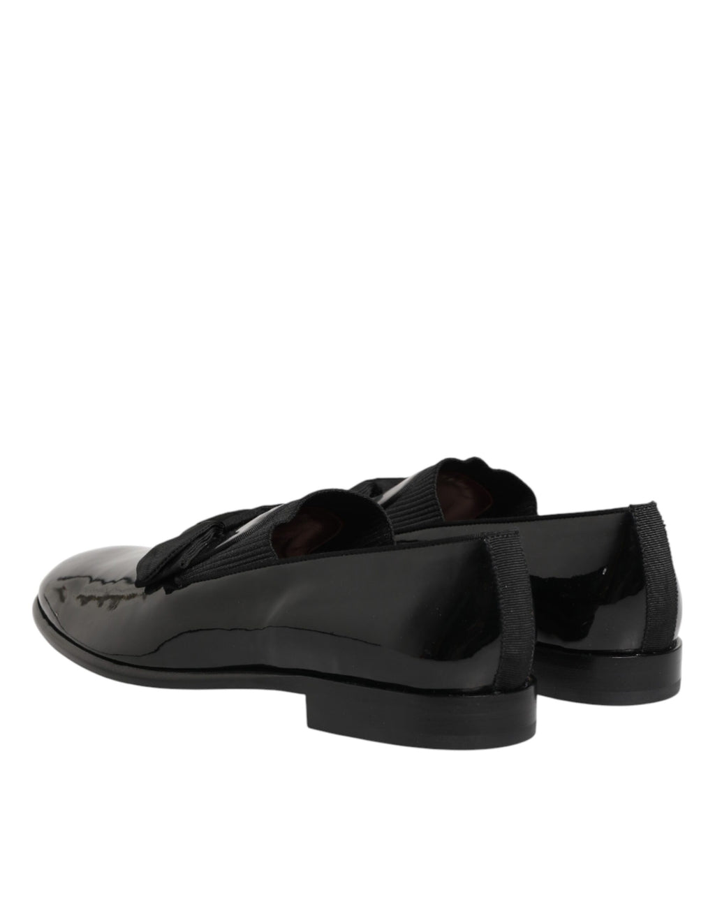 Black leather slip-on loafers for men by Dolce & Gabbana, featuring a sleek design and classic style.