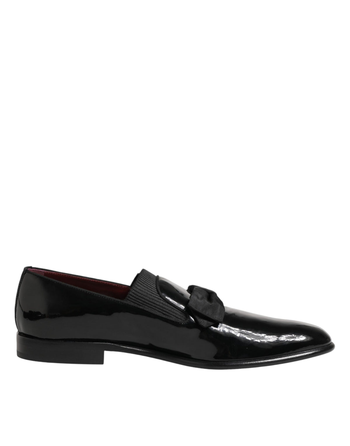 Dolce & Gabbana black leather slip-on loafers for men, stylish dress shoes with sleek design and polished finish.