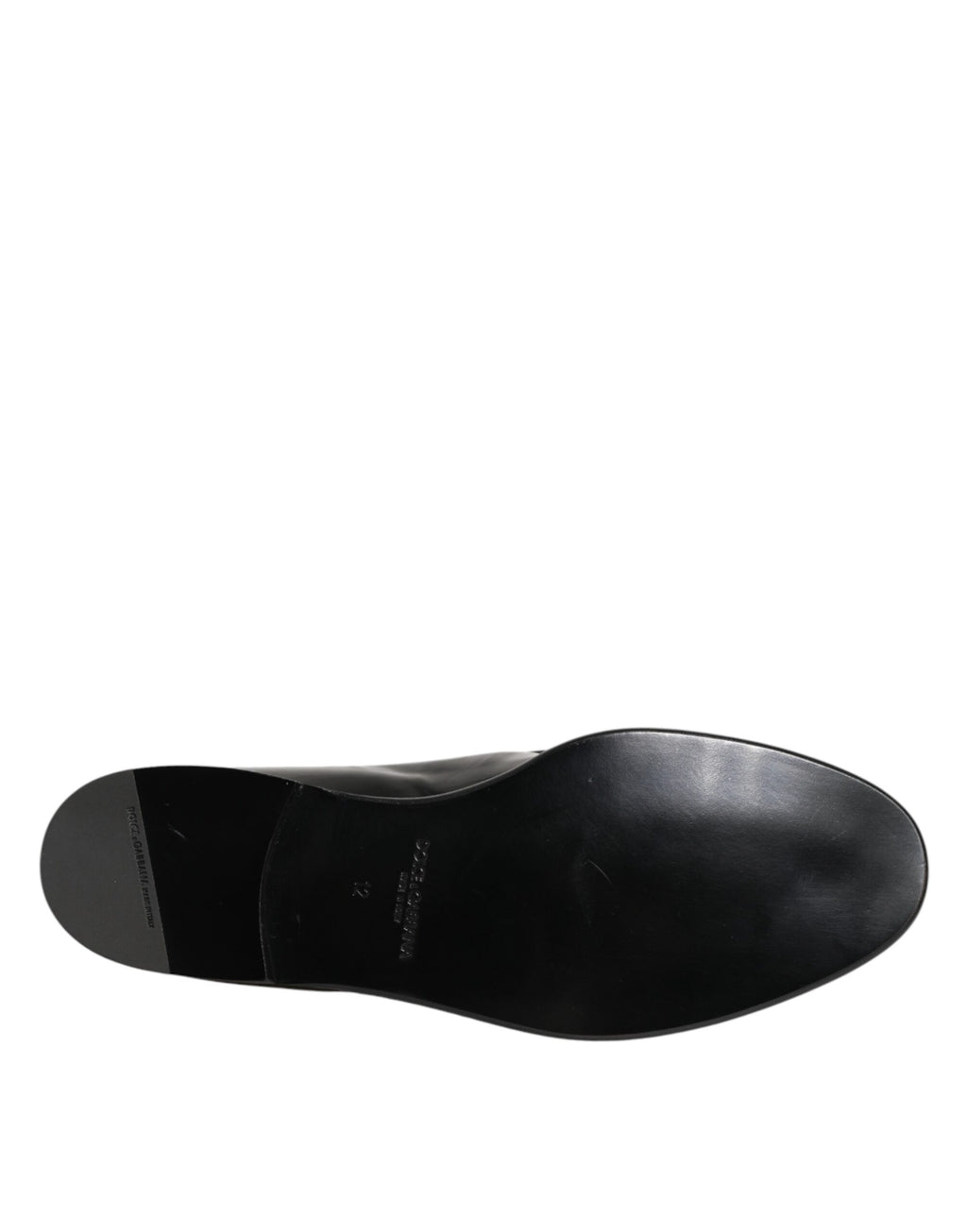 Dolce & Gabbana black leather slip-on loafers for men, stylish dress shoes with sleek design and polished finish.