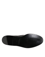 Dolce & Gabbana black leather slip-on loafers for men, stylish dress shoes with sleek design and polished finish.