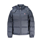 Tommy Hilfiger men's blue polyester jacket with front zipper and adjustable cuffs, casual style for everyday wear.