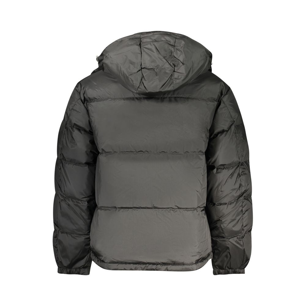 Black polyester men's jacket by Tommy Hilfiger, featuring a sleek design and classic fit with brand logo accents.