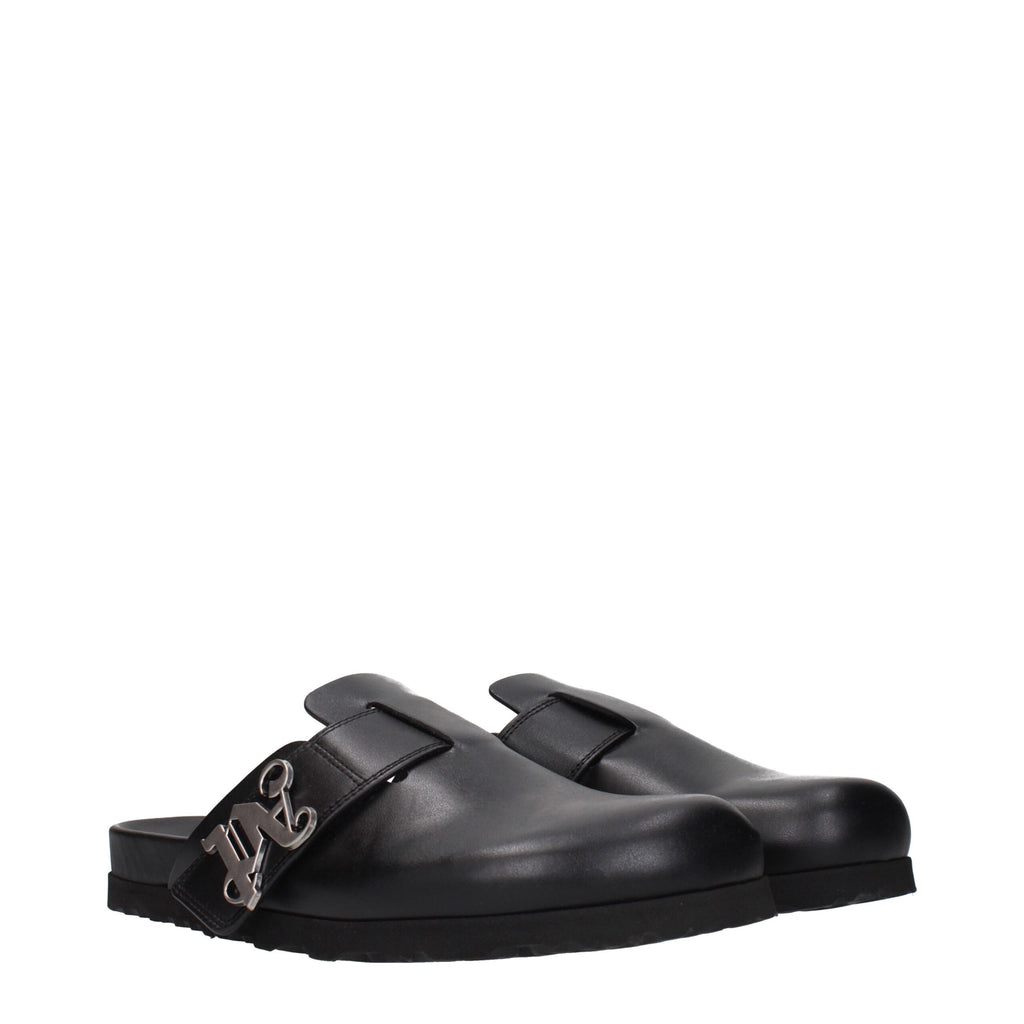 Palm Angels black leather slippers featuring a sleek design and comfortable slip-on style, perfect for casual wear.
