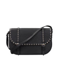 Black leather Valentino Garavani crossbody bag with sleek design and adjustable strap, showcasing luxury Italian craftsmanship.