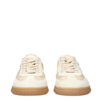 Valentino Garavani beige fabric low top sneakers with white soles and subtle branding detail.