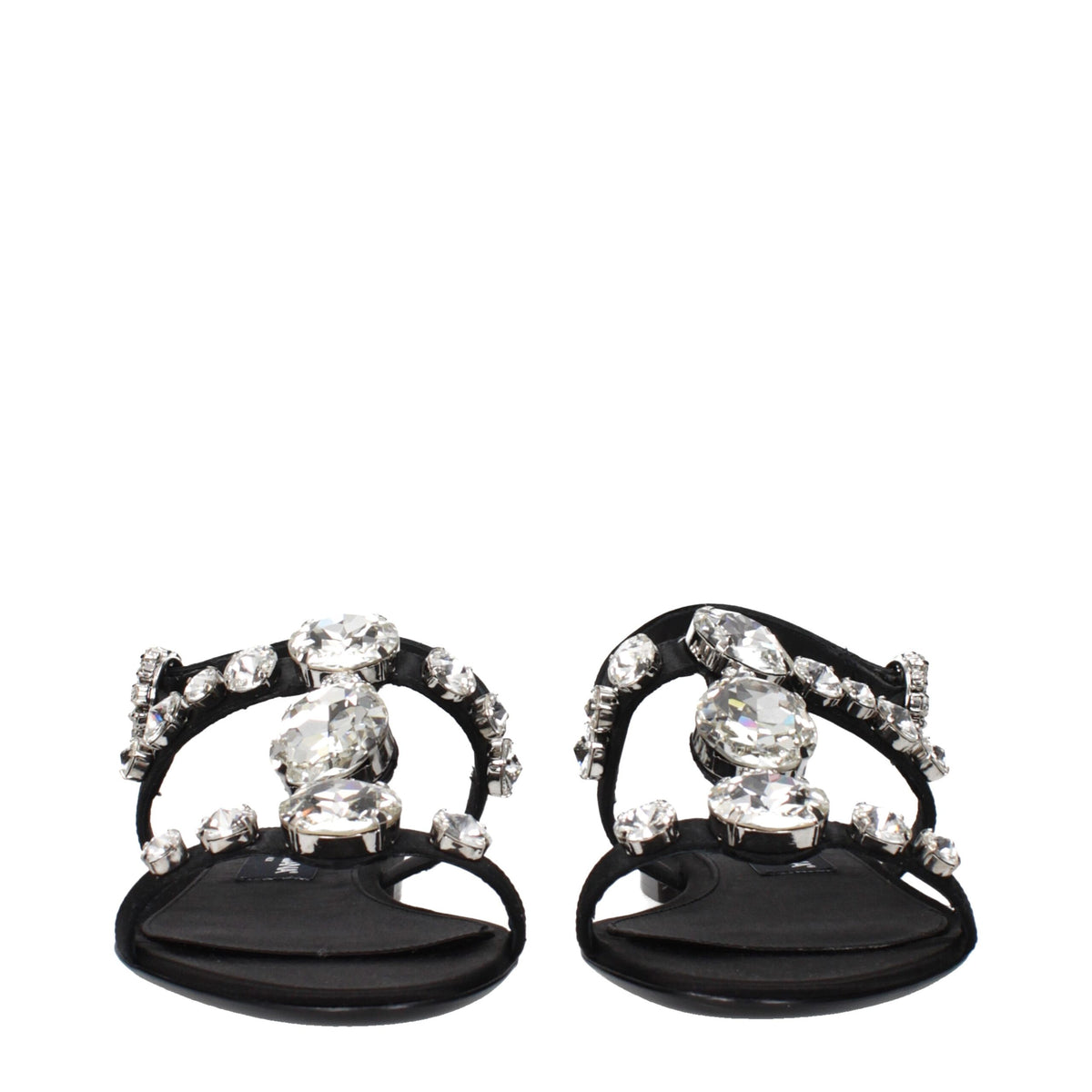 Black satin flat sandals by Dolce & Gabbana with sleek design and open toe, perfect for elegant summer footwear.