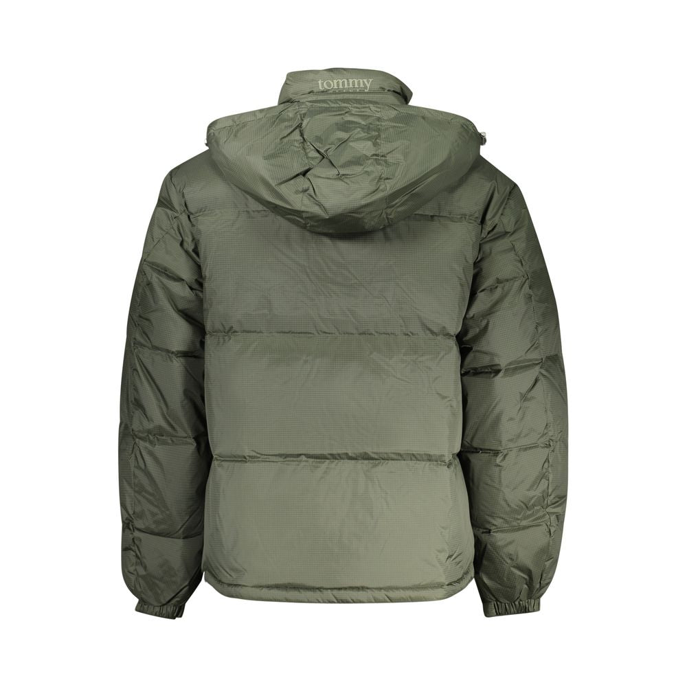 Tommy Hilfiger Verde polyester men's jacket displayed on a hanger, featuring a sleek design and front zipper.