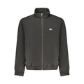 Tommy Hilfiger black polyester men's jacket with front zipper and collar, displayed on a hanger.