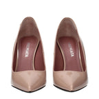 Premiata pink leather pumps with pointed toes and sleek design, styled on a white background.