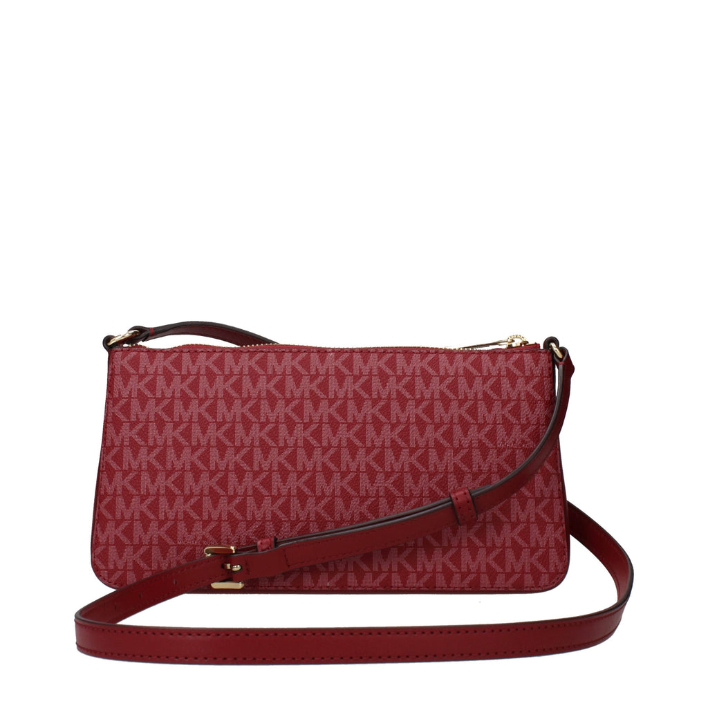 Michael Kors red fabric crossbody bag with adjustable strap and gold-tone hardware, featuring a sleek, compact design.