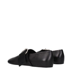 Black leather ballet flats by Jil Sander featuring a sleek, minimal design and rounded toe, perfect for casual or elegant wear.