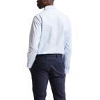 Selected blue cotton dress shirt with a classic collar and button-down front, displayed on a hanger.