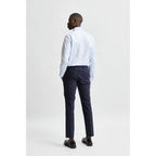 Selected blue cotton dress shirt with collar and long sleeves, neatly pressed and displayed on a hanger.