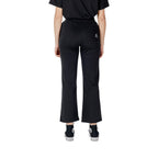 Converse black cotton joggers for workout, featuring elastic waistband and tapered fit, casual athletic pants.