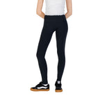 Converse black cotton leggings shown on a model, close-up view highlighting the soft fabric and comfortable fit.
