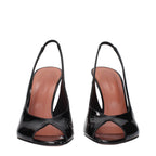 Black leather stiletto heel sandals by Amina Muaddi with sleek straps and elegant design, perfect for stylish occasions.