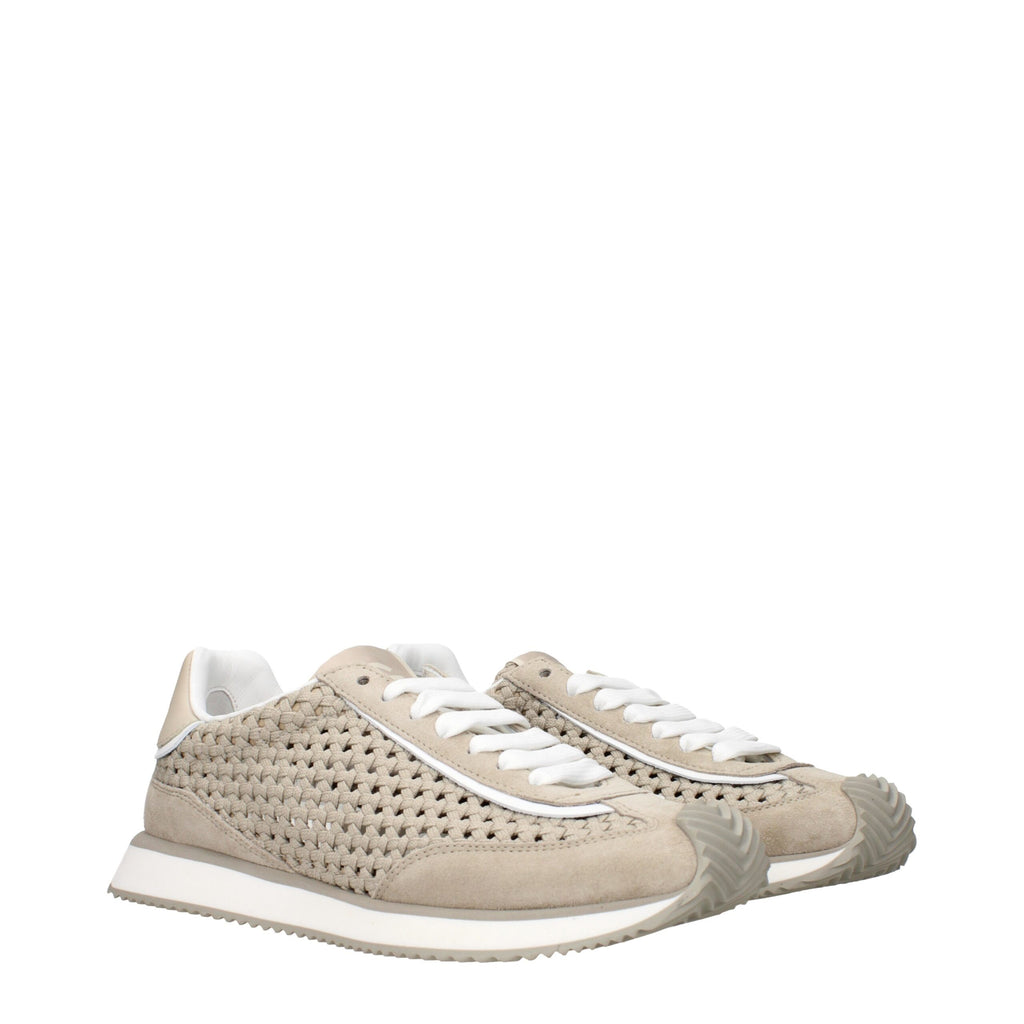 Beige fabric low top sneakers by Dolce & Gabbana with white rubber soles and subtle branding details.