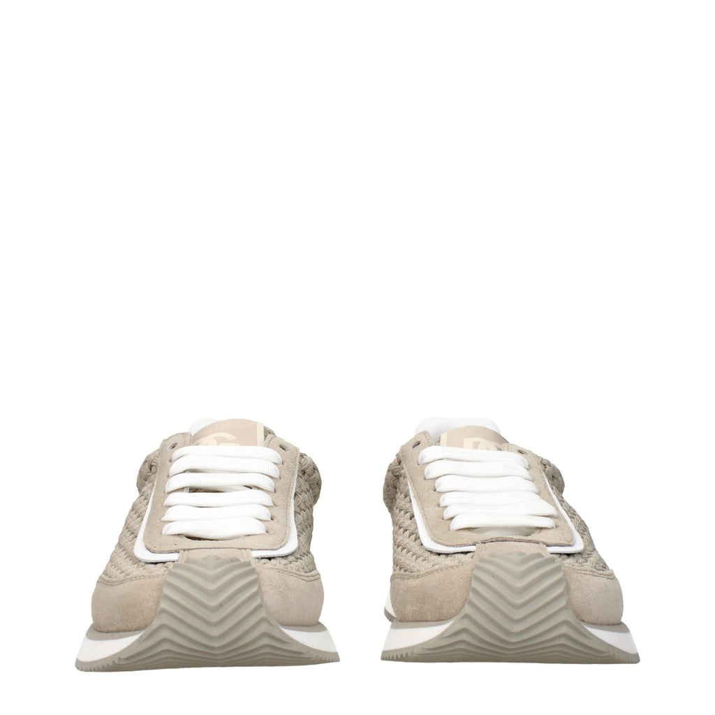Beige fabric low top sneakers by Dolce & Gabbana with white rubber soles and subtle brand detailing.
