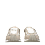 Beige fabric low top sneakers by Dolce & Gabbana with white rubber soles and subtle brand detailing.