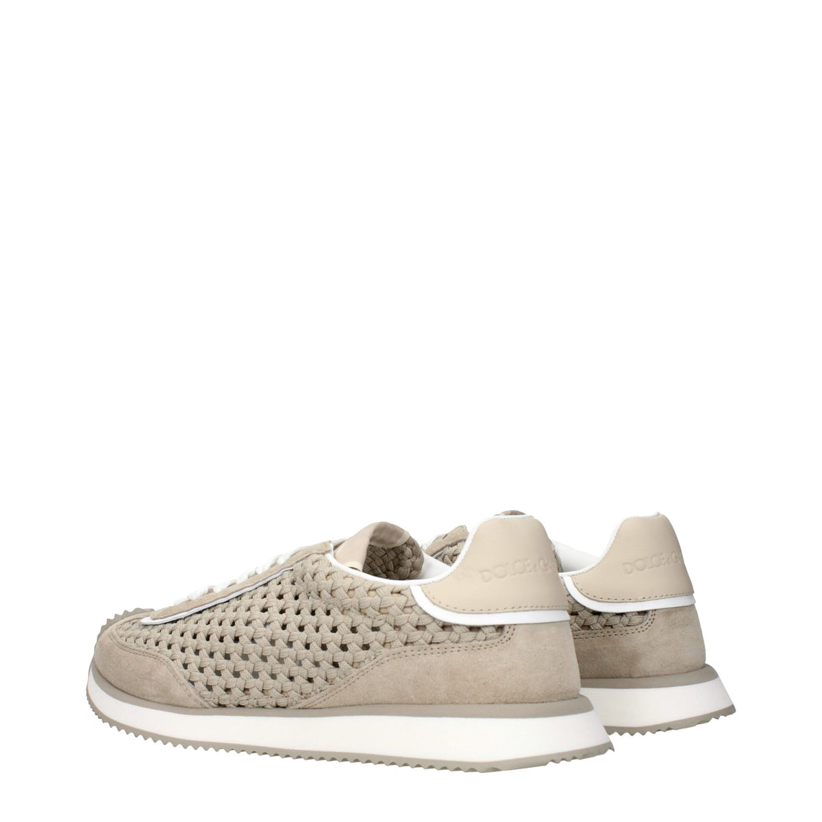 Dolce & Gabbana beige fabric low top sneakers with white rubber soles and classic design.