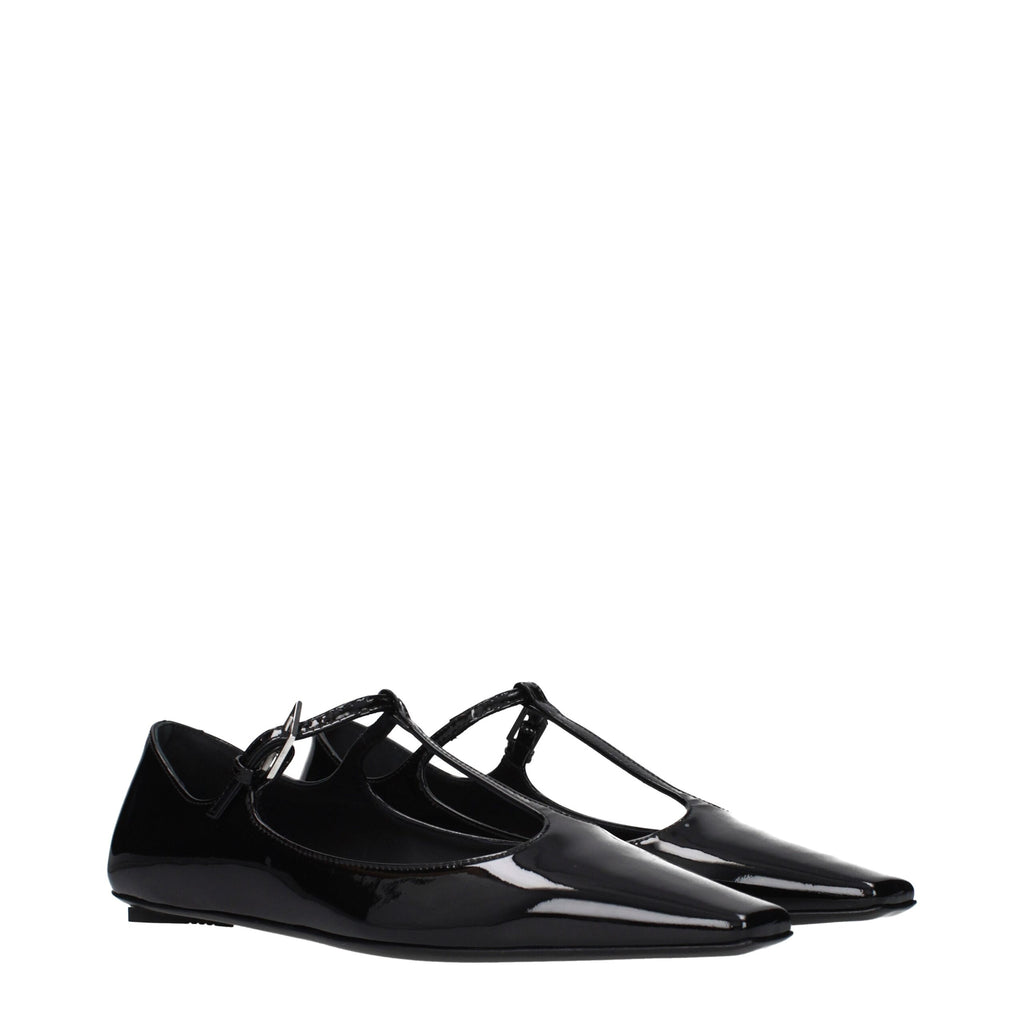 Black leather ballet flats by The Attico, featuring a sleek, rounded toe and smooth finish, perfect for stylish, comfortable wear.