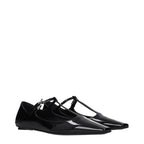 Black leather ballet flats by The Attico, featuring a sleek, rounded toe and smooth finish, perfect for stylish, comfortable wear.