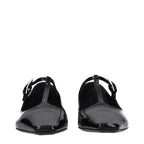 Black leather ballet flats by The Attico featuring a sleek, minimalist design and rounded toe for elegant, comfortable wear.