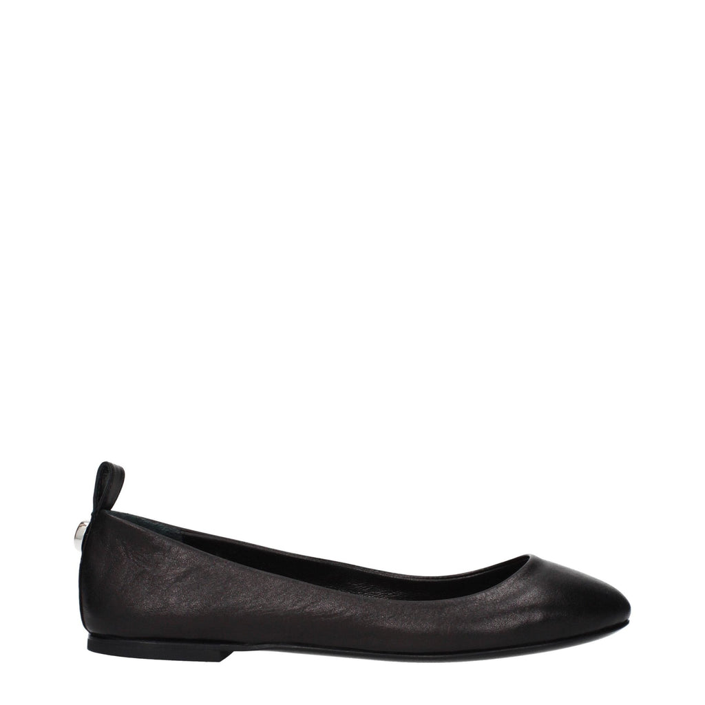 Black leather ballet flats from The Attico featuring a sleek, classic design and rounded toe.