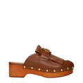 Brown leather slippers by Valentino Garavani featuring a sleek, minimalist design and comfortable slip-on style.