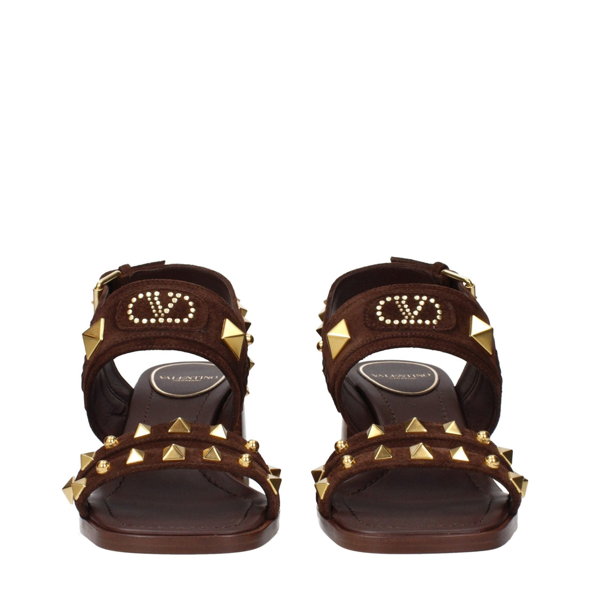 Brown leather strap-on sandals by Valentino Garavani with open toe design and ankle strap for a stylish, sophisticated look.