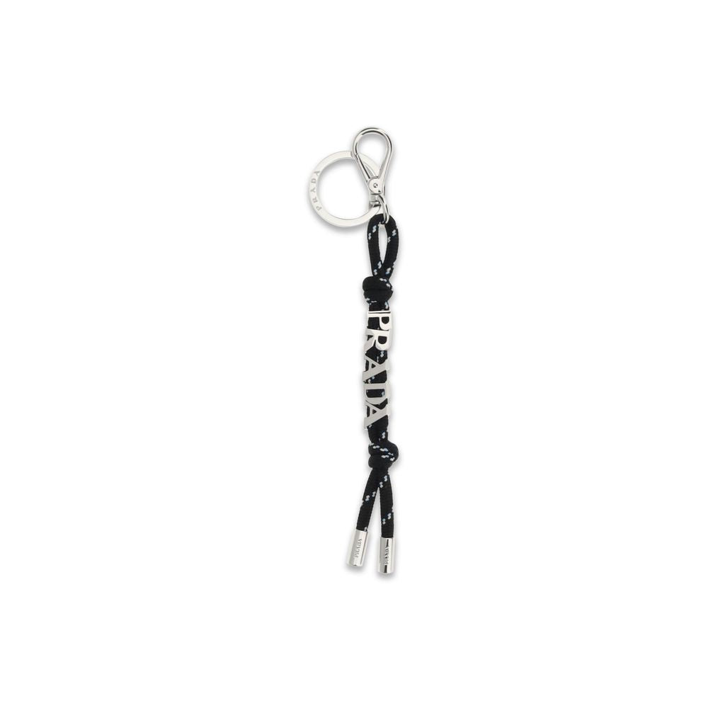 Prada black recycled polyamide keychain with silver-tone hardware and Prada logo detail, hanging from a set of keys.