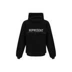 Black cotton sweatshirt by Represent featuring a relaxed fit and minimal branding, suitable for casual wear.