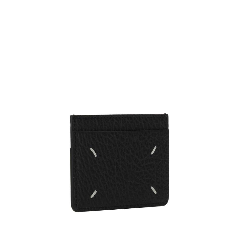 Maison Margiela black calf leather Bos Taurus wallet with sleek design and subtle branding, featuring multiple card slots.