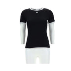 Black cotton T-shirt by Courrèges featuring a classic fit and minimalist design, shown on a plain background.