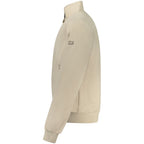 Norway 1963 beige cotton men's jacket displayed on a hanger with front pockets and a classic collar.