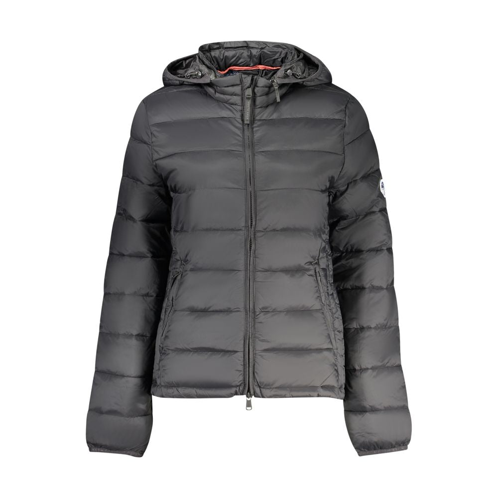 North Sails black polyester women's jacket displayed on a hanger, showing its sleek design and lightweight fabric for outdoor wear.
