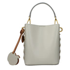 Gray leather handbag by Stella McCartney with sleek design and structured shape, featuring top handles and subtle branding details.
