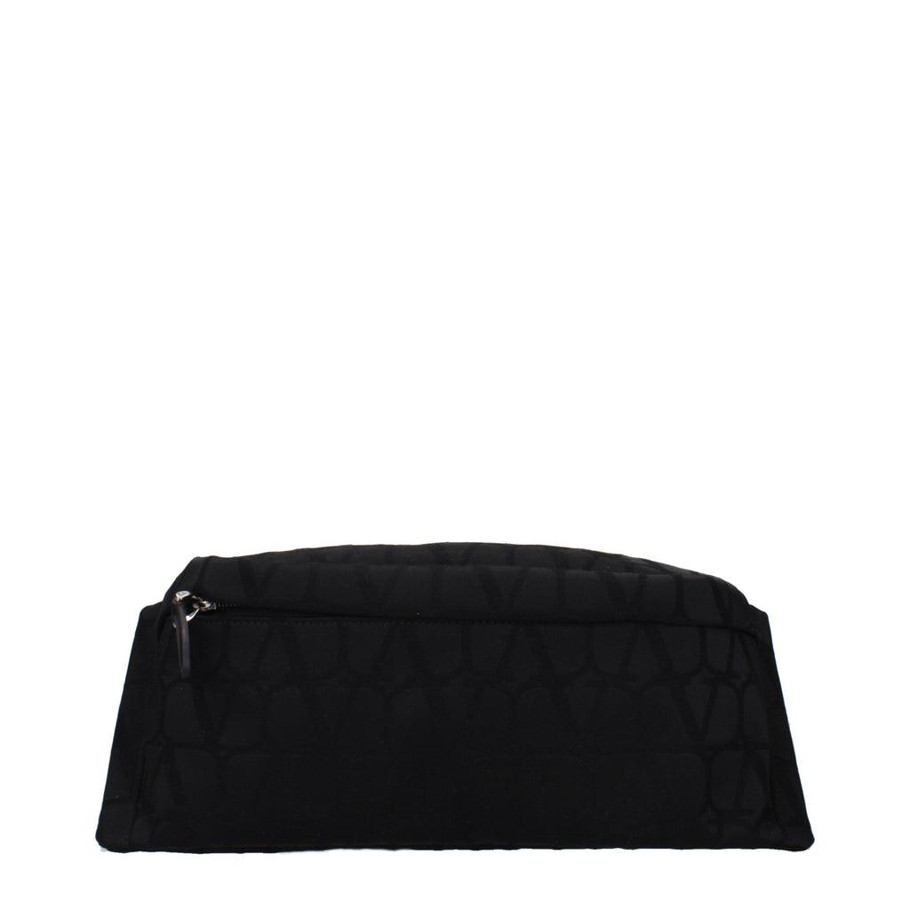 Black fabric backpack from Valentino Garavani featuring sleek design and adjustable straps, ideal for stylish everyday use.