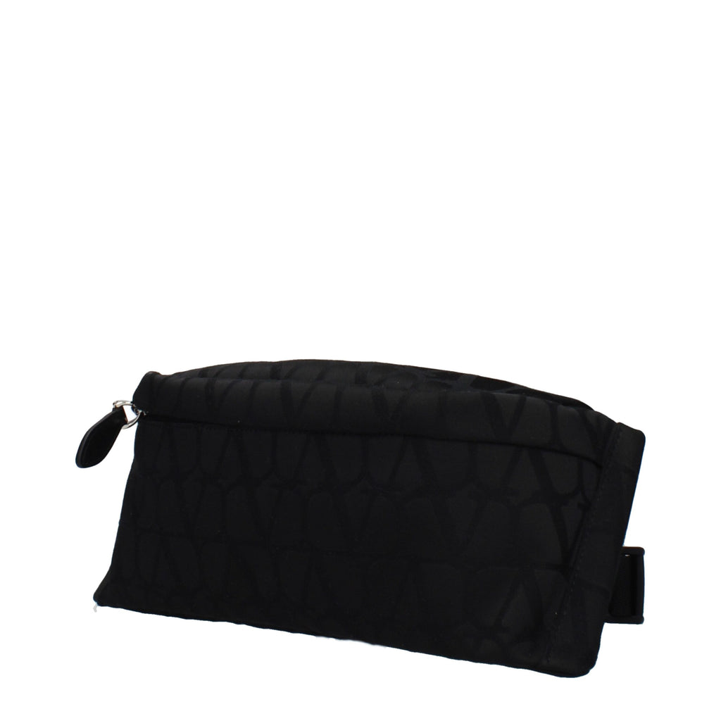 Valentino Garavani black fabric backpack with sleek design and adjustable straps, featuring logo accents and top handle for versatile carrying.