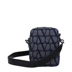 Valentino Garavani blue fabric crossbody bag with adjustable strap and sleek design, perfect for stylish everyday wear.