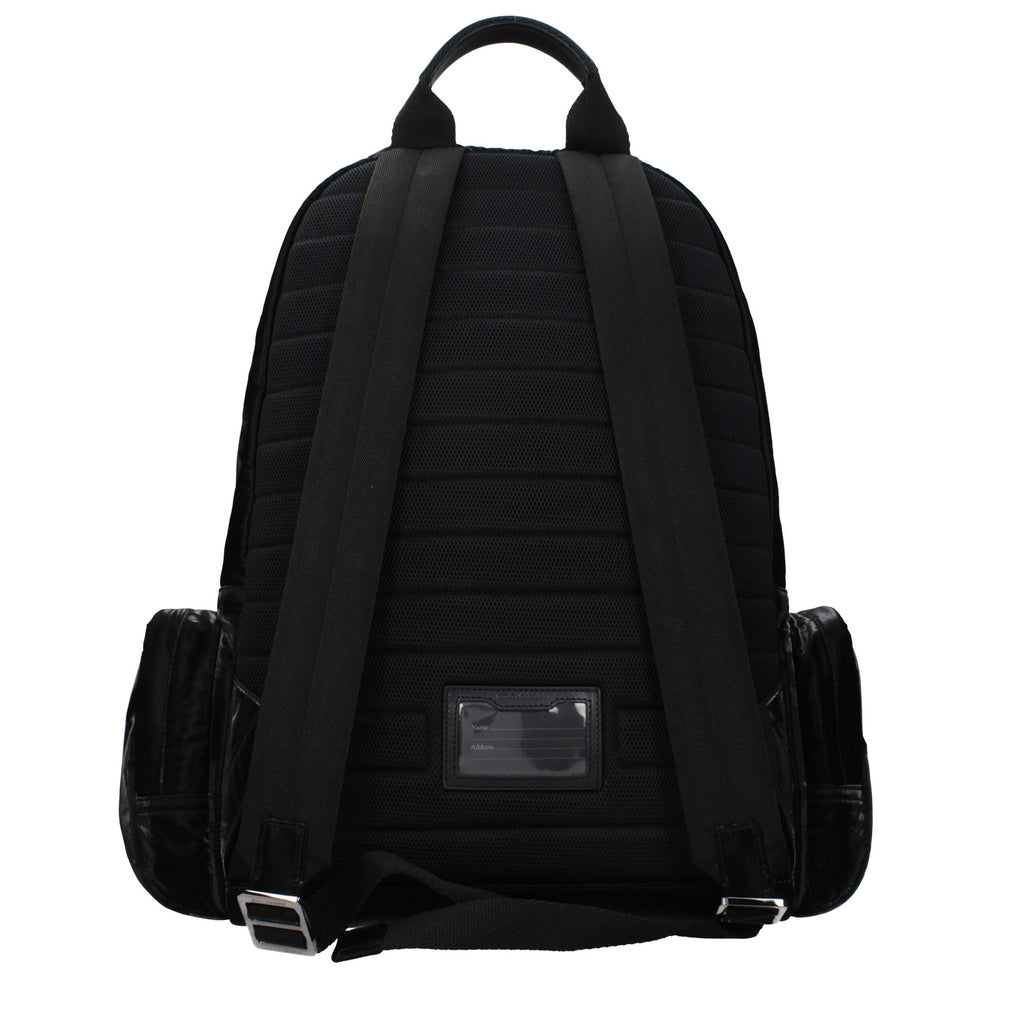 Dolce & Gabbana black nylon backpack with adjustable straps and logo detail, suitable for casual and everyday use.