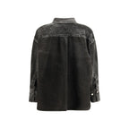 Black denim shirt from The Attico featuring a classic collar, button-down front, and long sleeves, styled on a mannequin.