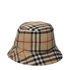 Burberry beige cotton bucket hat with wide brim and classic logo detail, stylish accessory for sun protection