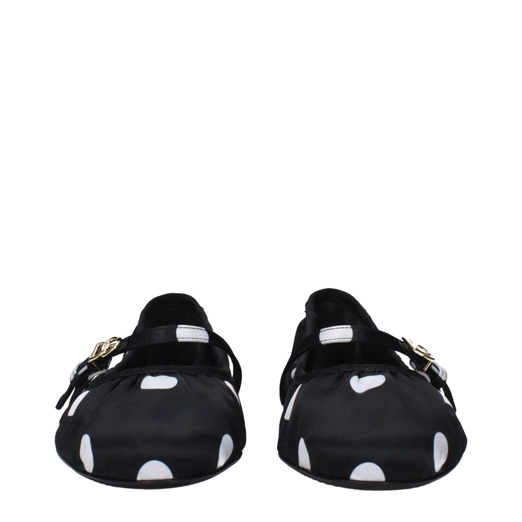 Dolce & Gabbana black fabric ballet flats with round toe and sleek design, perfect for casual or dressy wear.